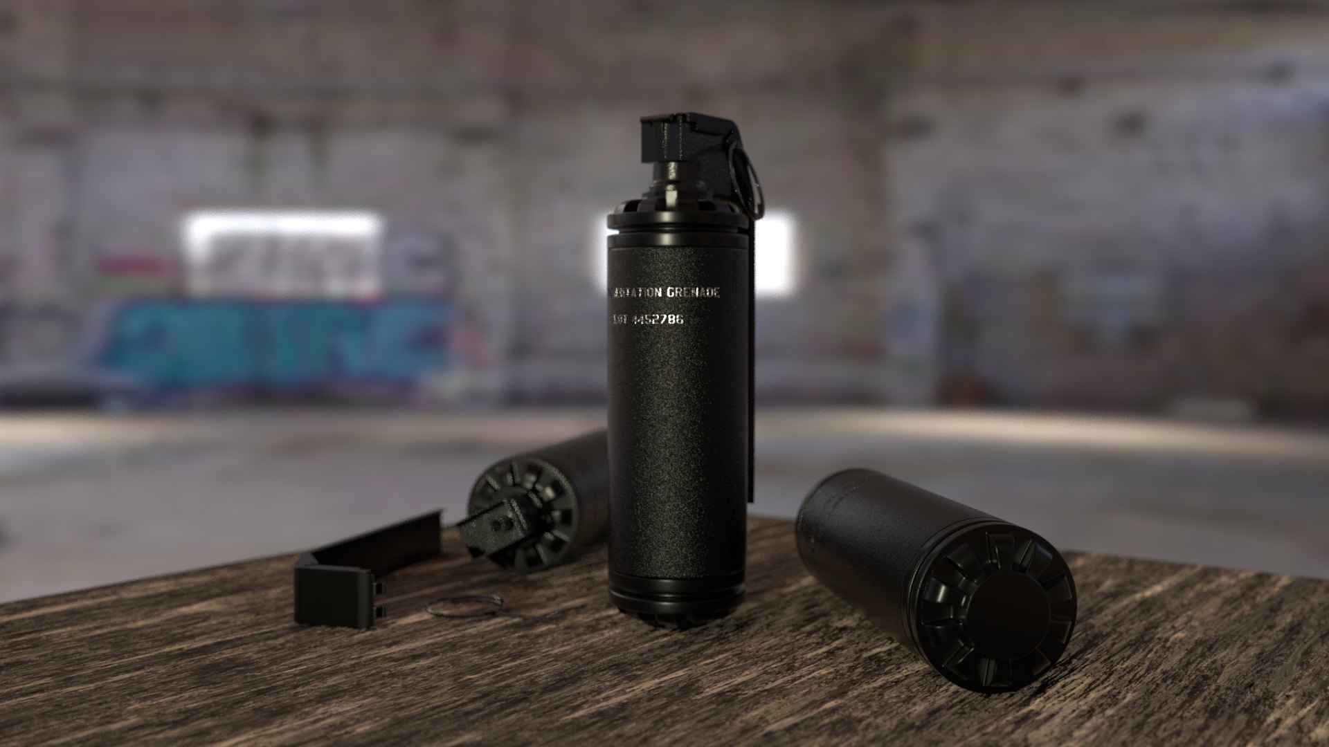 Black canister prop with parts on a wooden table