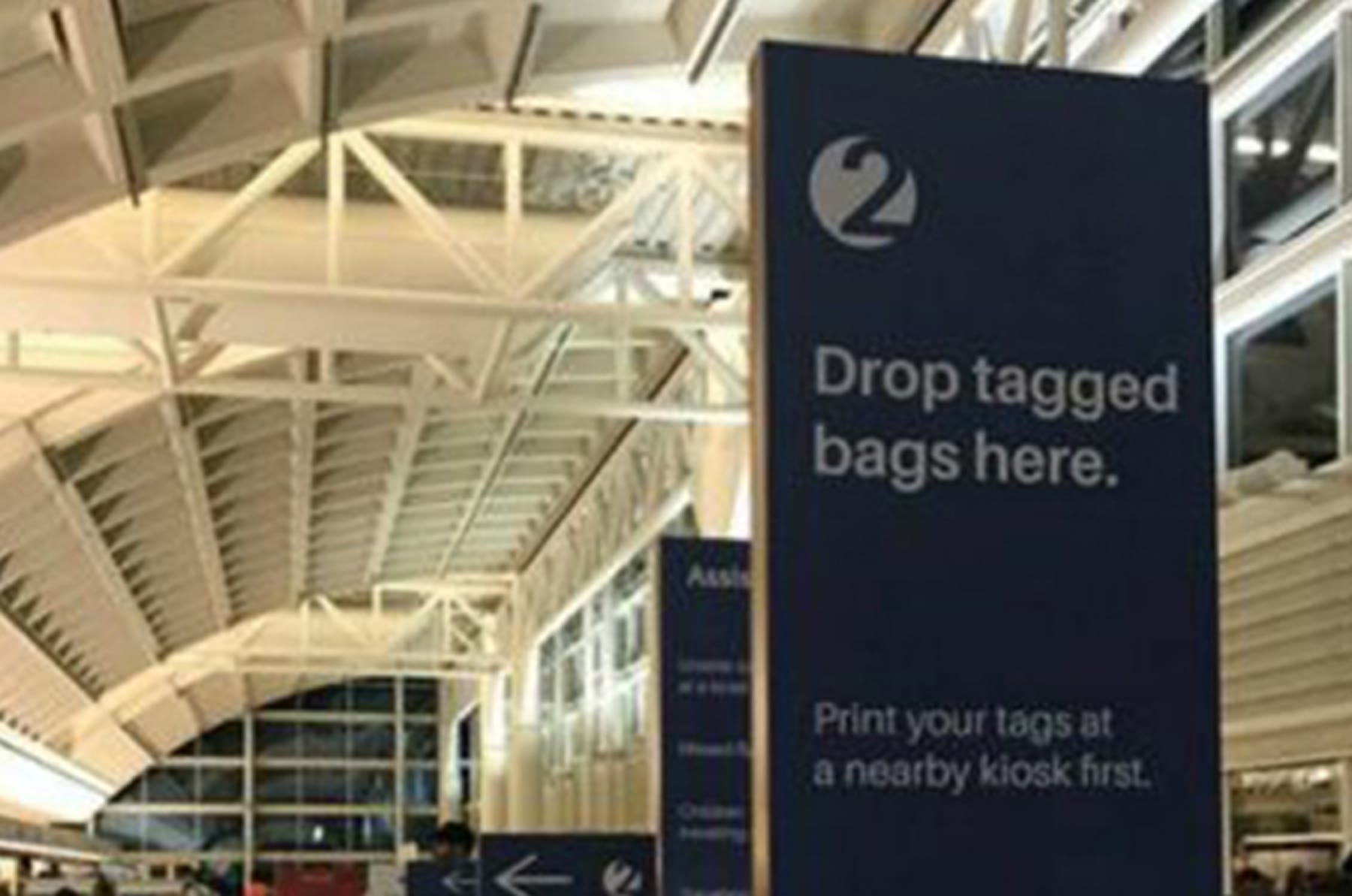 Liberty National Airlines bag drop sign