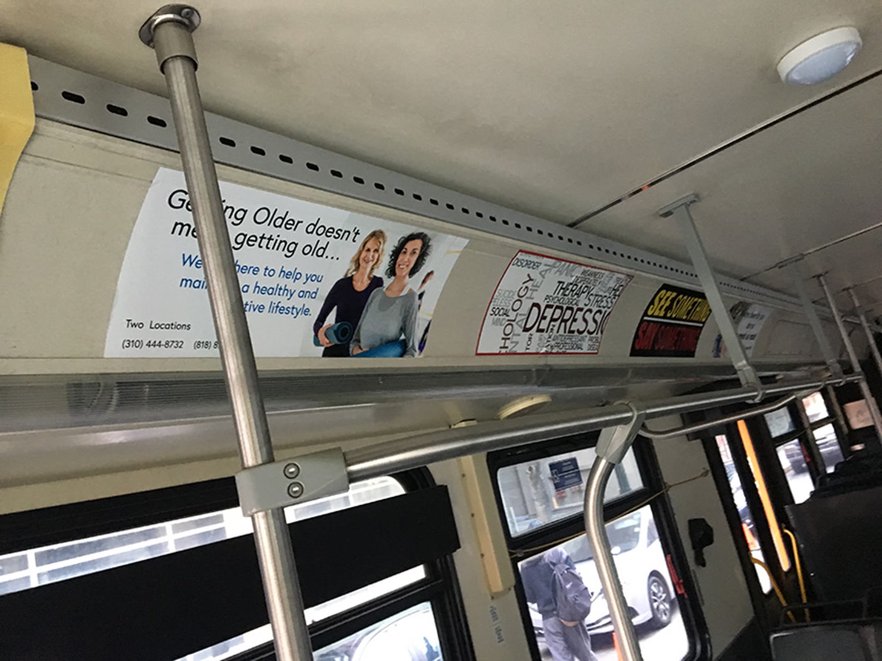 More advertising cards inside a bus