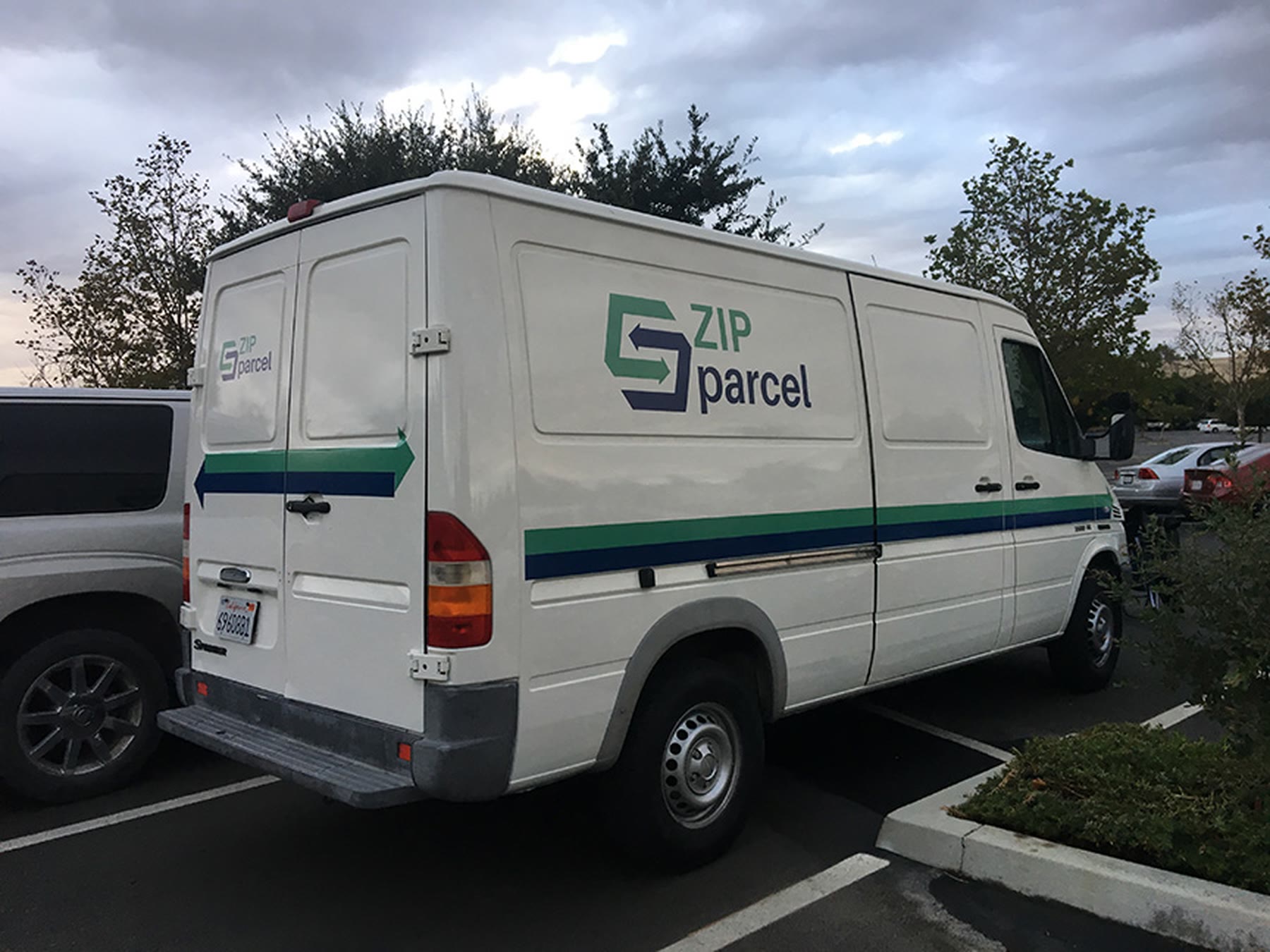 White Zip Parcel delivery van