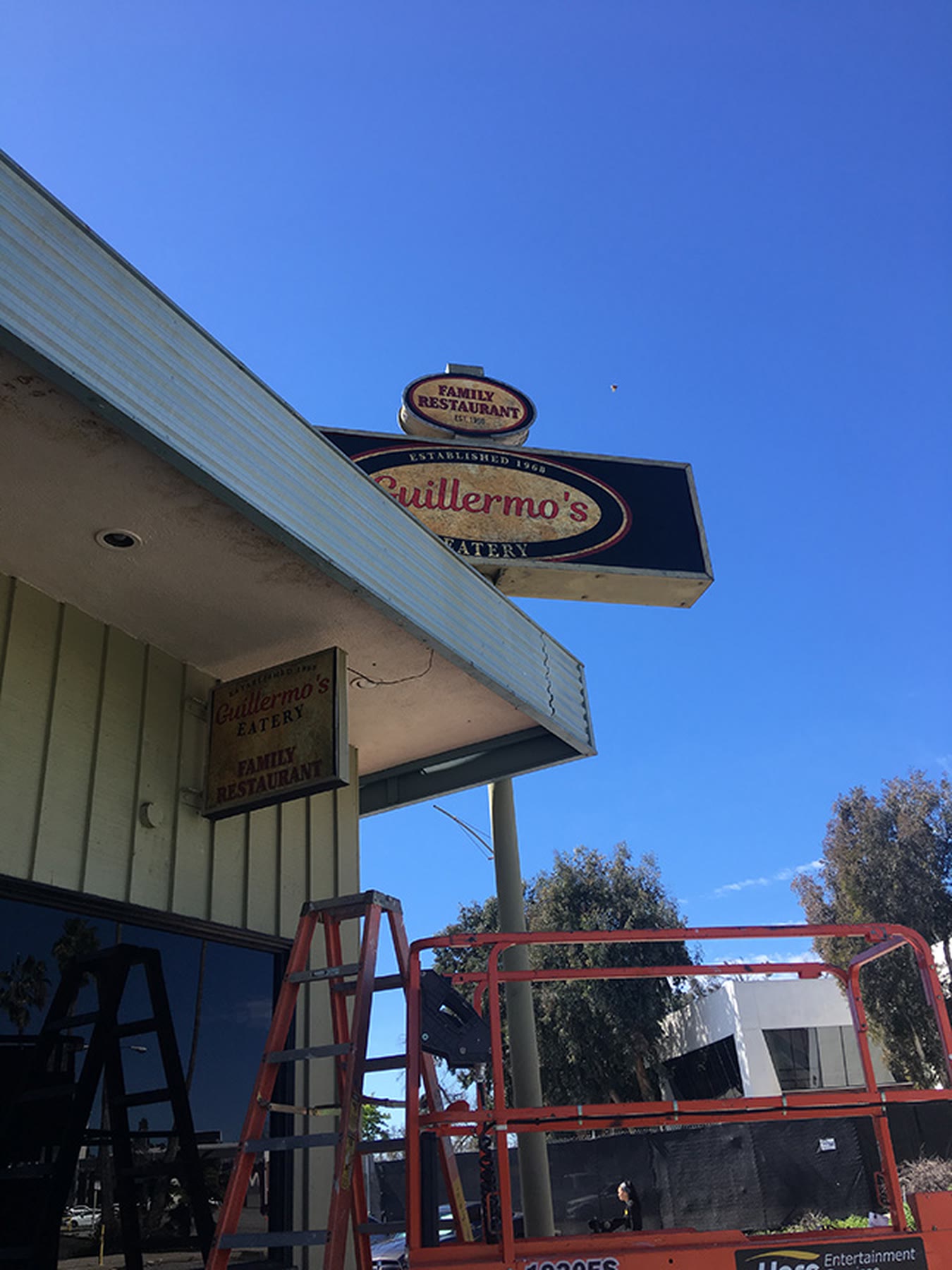Guillermo’s pole sign being installed