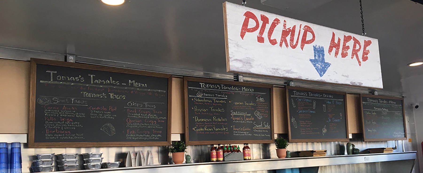 Pickup Here sign