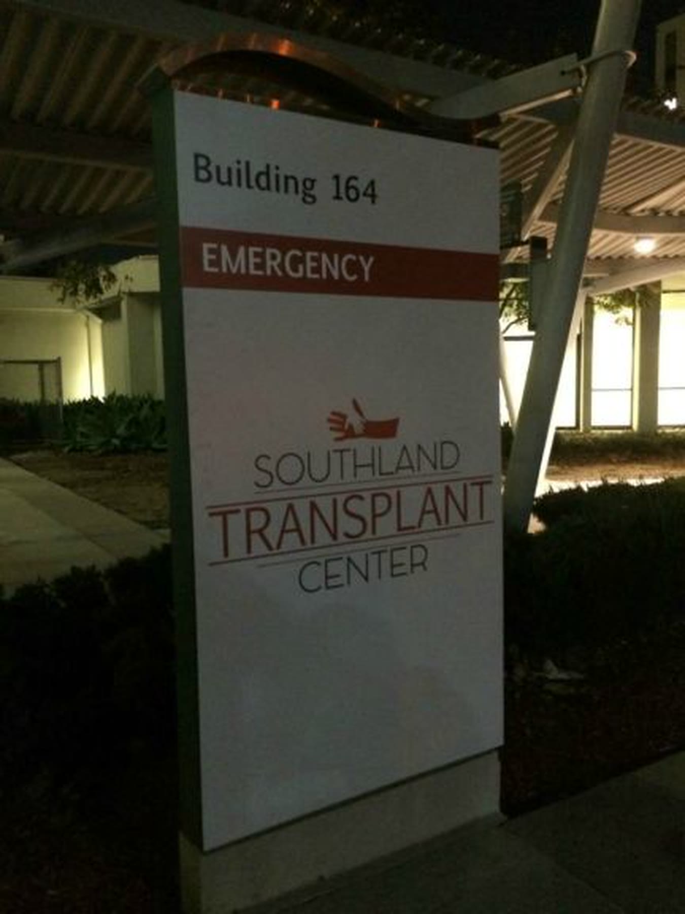 Transplant center sign at night