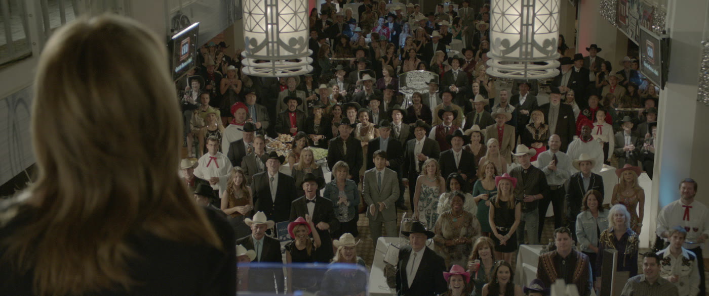 A packed ballroom crowd
